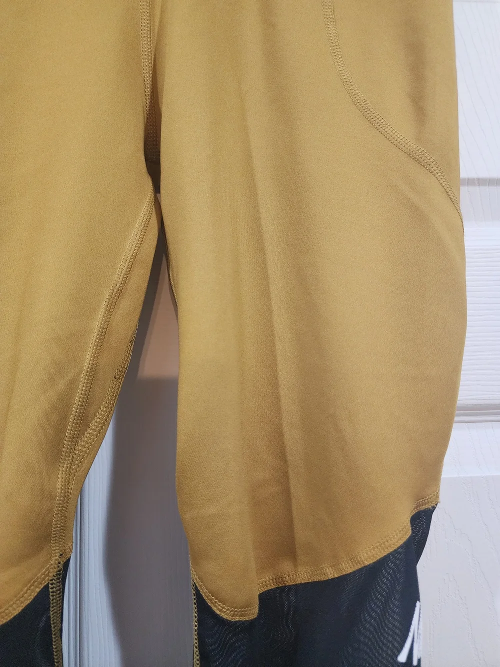 Nike Womens Mustard and Black Performance Leggings with White Stripe